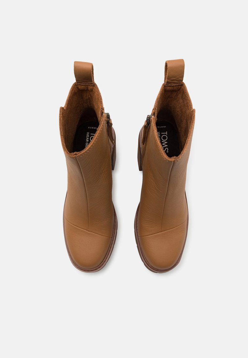 Braune Lederstiefeletten mit glatter Textur, runder Zehenform und seitlichem Reißverschluss. Sie haben einen kurzen Schaft und eine Schlaufe für einfachen Zugang.