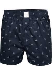 Boxer in cotone blu navy con un motivo ripetuto di fette di limone bianche, vita elasticizzata e chiusura con bottone davanti.