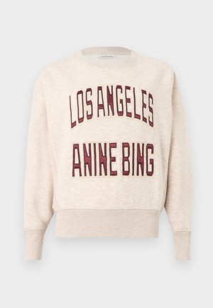 Μπεζ φούτερ με ριμπ μανσέτες και στρίφωμα, με μεγάλα βουργουνδί γράμματα που γράφουν "LOS ANGELES" και "ANINE BING" στο μπροστινό μέρος.