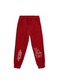Rote Sweatpants aus weichem Stoff, mit elastischem Bund und Kordelzug, seitlichen Taschen und weißen Druckgrafiken.