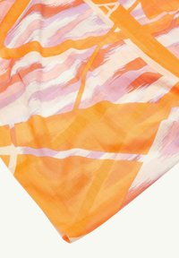 Orange patterned scarf made of lightweight fabric, featuring wavy brushstroke designs in shades of light pink and orange.