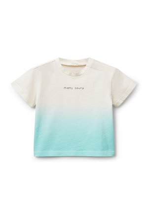 T-shirt a maniche corte in crema che sfuma in turchese chiaro. Presenta il testo "mamy saura" stampato in carattere scuro. Materiale in cotone con una texture morbida.