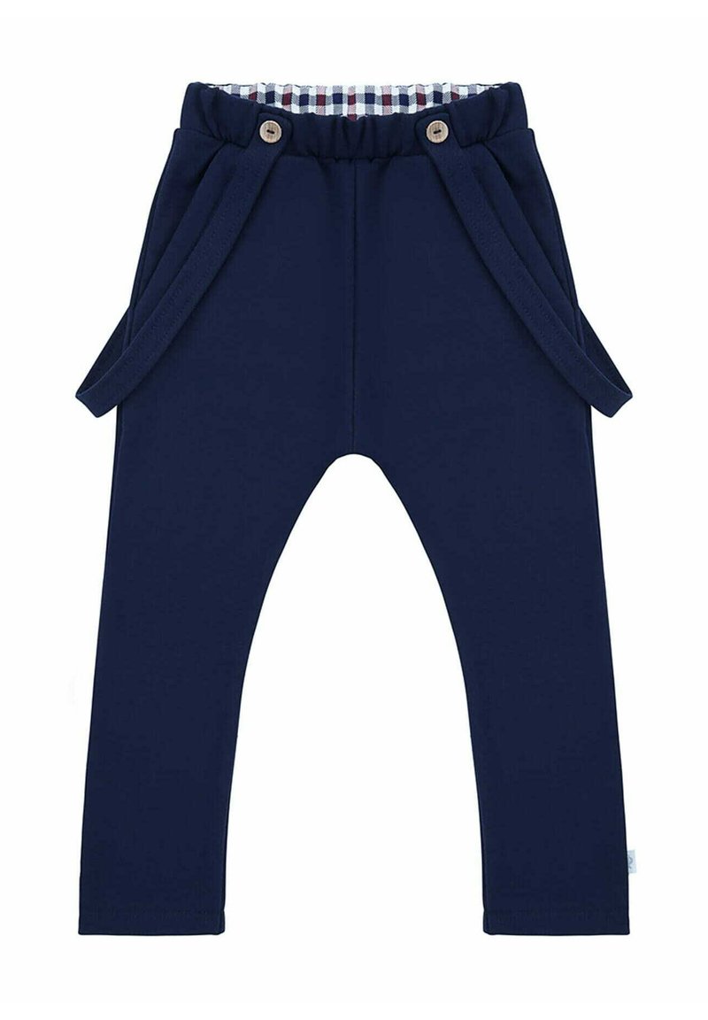 Granatowe spodnie wykonane z miękkiego materiału, z marszczonym pasem w talii z guzikami oraz bocznymi kieszeniami ozdobionymi sznurkami. Widoczna podszewka w kratkę.