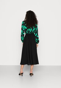 Gina Tricot LOLLO SKIRT - Saia evasé - black