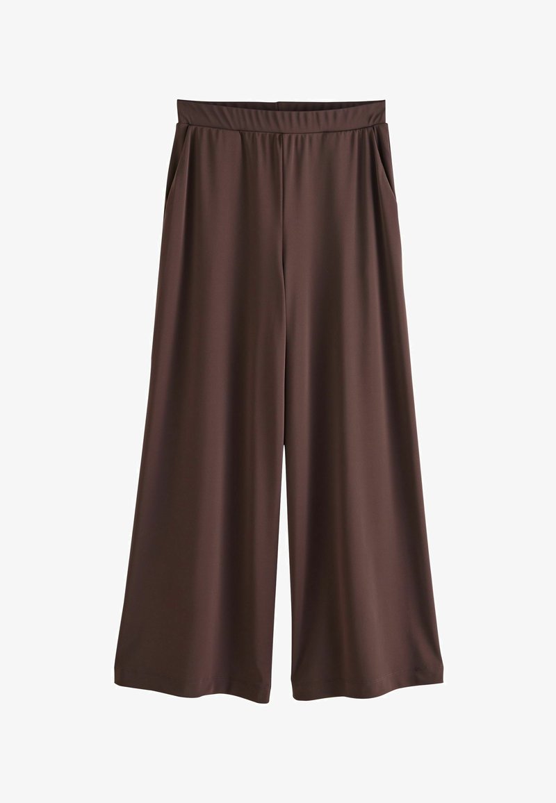 Pantalon marron à jambes larges avec une ceinture élastique et des poches latérales, présenté à plat sur un fond blanc.