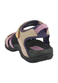 Beige and purple sandal with adjustable straps, textured fabric, a cushioned black sole, and a pink accent on the footbed.