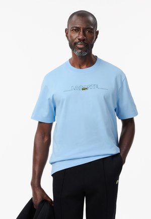 Lacoste BRODÉ FABRIQUÉ EN FRANCE - T-shirt imprimé - bleu