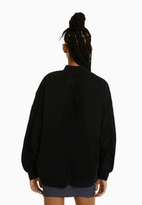 Bershka Tröja med dragkedja - black