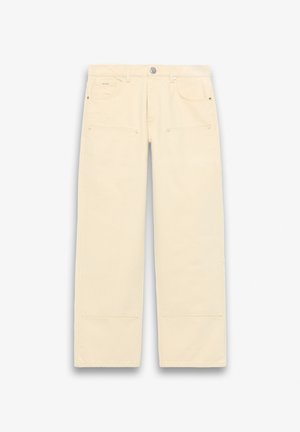 Beige vide bukser med lommer foran og bak, beltehemper, og knapp- og glidelåslukking, vist flatt mot en hvit bakgrunn.