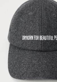 Grey felt baseball cap with a curved brim. Features white embroidered text: "DRYKORN FOR BEAUTIFUL PEOPLE" on the front.