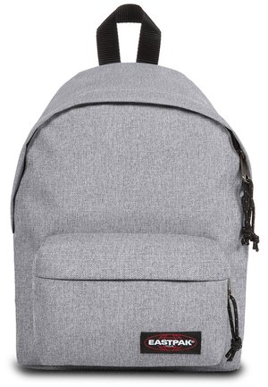 Gray fabric backpack with a rounded shape, a front zip pocket, and black accents. The adjustable straps feature a textured finish.