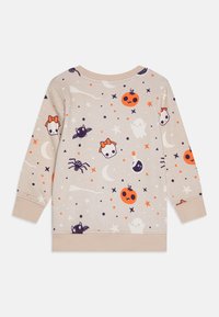 Dugi rukav bež dukserica; s Halloween motivom koji uključuje duhove, bundeve, zvijezde i pauka; mekana, teksturirana tkanina.