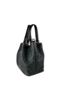 Black woven handbag with textured design, featuring two leather handles and silver hardware accents. Structured shape with a wide base.