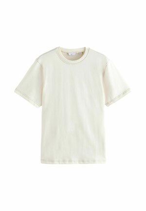 T-shirt di cotone in avorio con maniche corte, scollo rotondo e dettaglio di cuciture a contrasto. Tessuto leggero con una texture liscia.