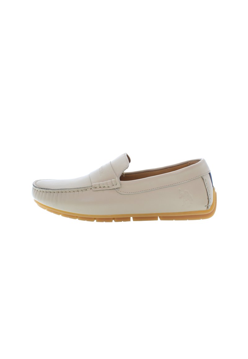 Light beige leather loafers with a moccasin-style stitched toe, rubber sole in contrasting tan, and subtle branding on the side.