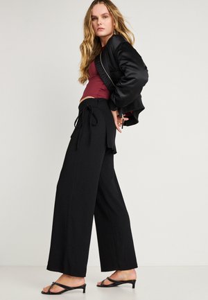 APRON TROUSERS - Hlače - black