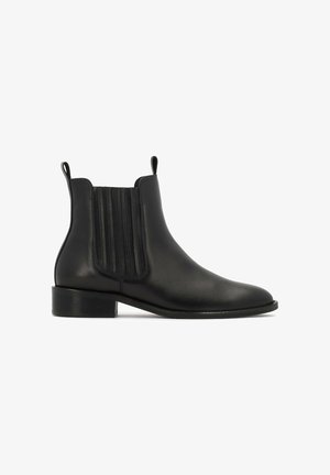 Black leather ankle boots with elastic side panels, rounded toe, and a low block heel. Features ribbed texture on side panels.