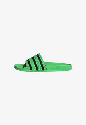 Green slide sandal with three black stripes on the upper band, made of textured rubber, featuring a flat sole and branded logo.