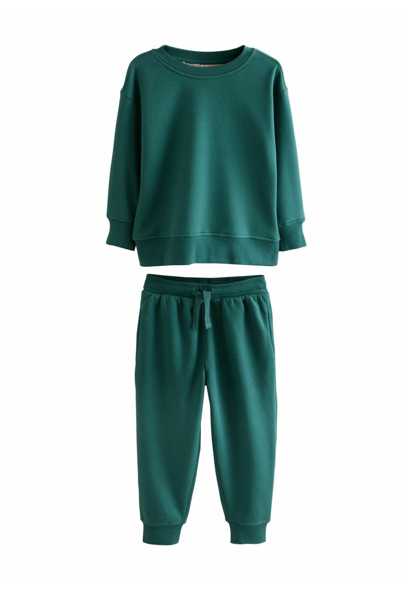 Green sweatshirt and matching joggers set. Sweatshirt features a rounded neck and wide cuffs; joggers have an elastic waistband and tapered leg.