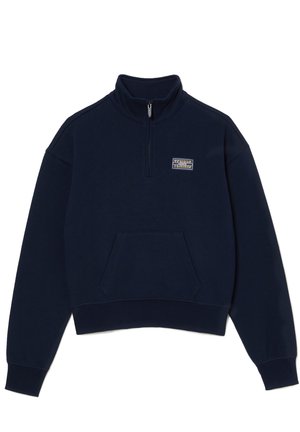 Sweat-shirt bleu marine avec un col montant, une fermeture éclair au quart, et une poche kangourou à l'avant ; comporte un petit patch logo sur le côté gauche de la poitrine.