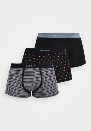 Trois paires de boxers pour hommes : une noire, une noire avec des pois multicolores, et une grise avec des rayures bleues et beiges, toutes avec une ceinture de marque.