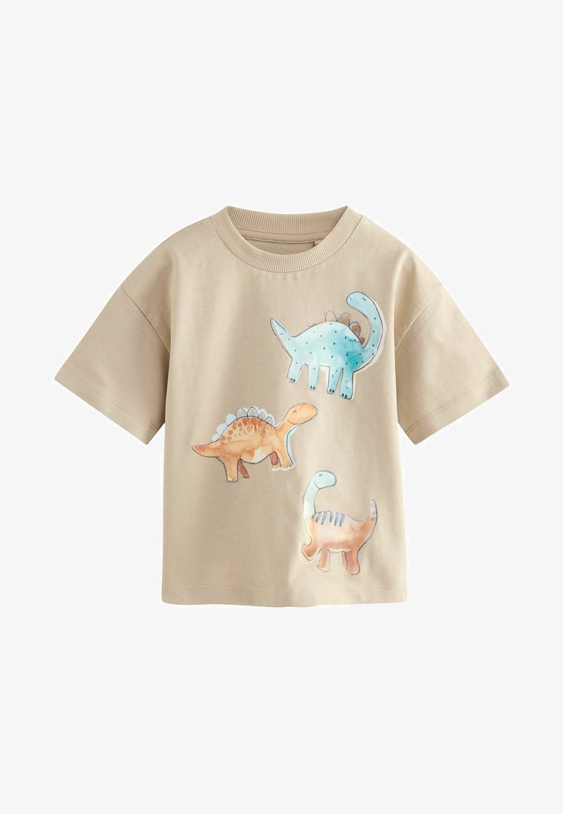 Beež puuvillane T-särk, millel on kolm värvilist dinosauruse illustratsiooni: sinine, millel on täpid, oranž ja roosa, millel on triibud.