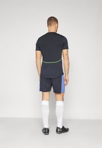 Under Armour CHALLENGER - Sport rövidnadrágok - black/celeste