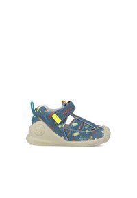 Siniset hiekka kengät, joissa on moniväriset kuviot, säädettävä remmi, kumipohja ja vahvistettu varvas. Kevyt muotoilu mukavuutta varten.