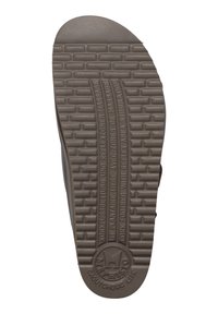 Semelle en caoutchouc marron avec un motif texturé ressemblant à des briques. Possède un logo circulaire et un texte en relief sur le côté pour l'adhérence et le branding.