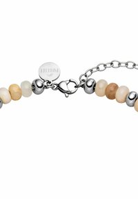 Verstellbares Armband mit Keramikkugeln in Creme, Beige und Hellbraun, mit silbernen Metallelementen und einem Karabinerverschluss.