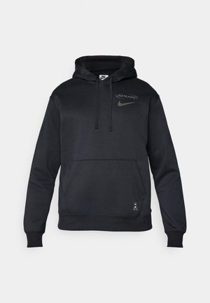 Melns Nike sudraba ar kapuci, ar saistošām auklām, logo uz krūškurvja, kabata priekšā, ribinātām aprocēm un apakšmalai, izgatavots no mīksta, gluda auduma.