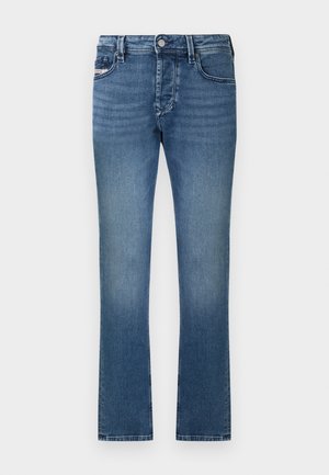 Zilas džinsa bikses ar taisnām kājām, piecu kabatu dizainu un izbalējušu apdari. Aprīkotas ar jostas cilpām un metāla pogas aizdari.