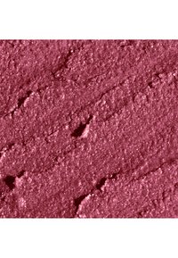 Rosa glitrende pulver med en fin, teksturert overflate. Synlige glitrer reflekterer lys og skaper en myk glans; har ujevne, lagdelte mønstre.