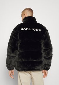 Karl Kani Talvitakki - black