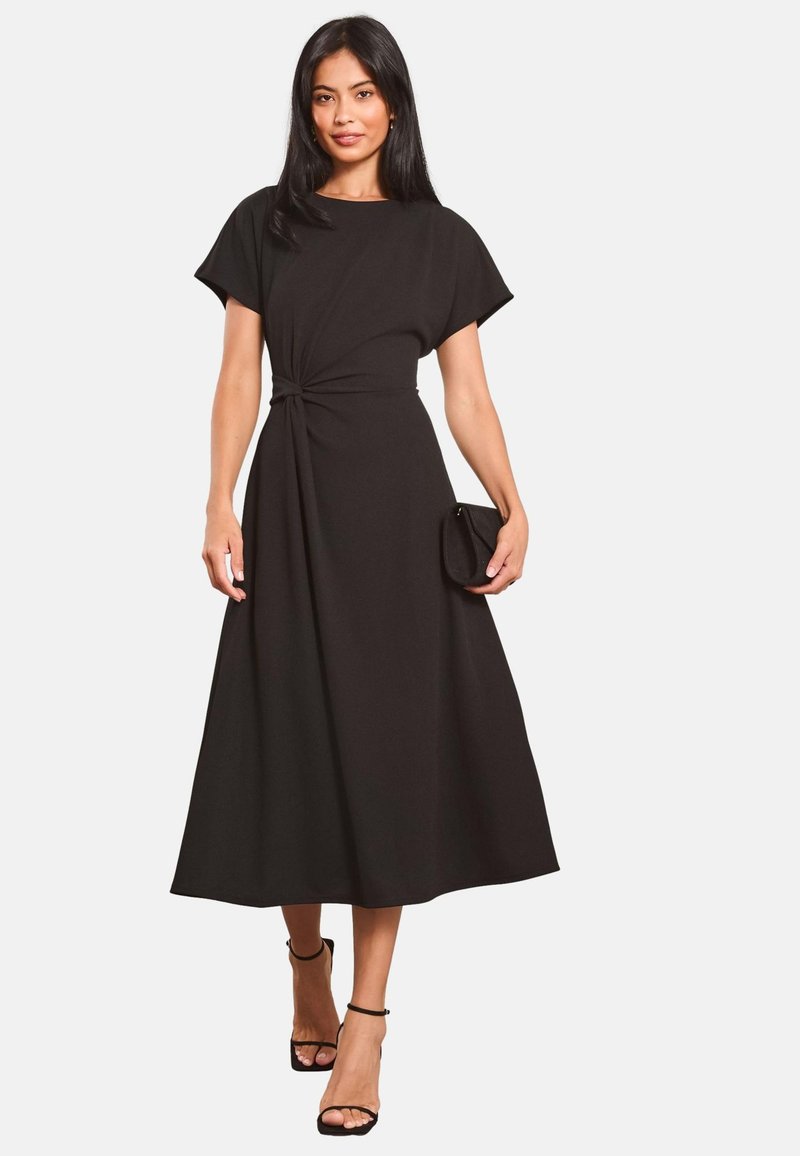 black short sleeve maxi dress Drop Waist Dress-FINAL SALE Color:Provencal Blue Floral Length_High Low Sexy woman wearing black