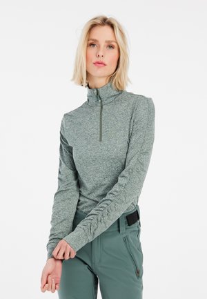 Langarm, lichtgroene pullover met een kwart-rits aan de voorkant en textiel met een textuur. Bevat aansluitende mouwen en een hoge kraag.