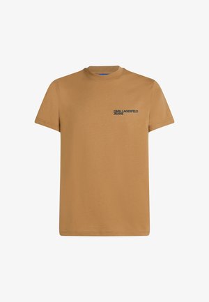 Kamelno obarvana majica s kratkimi rokavi in okroglim izrezom, z majhnim logotipom "Karl Lagerfeld Jeans" na levi strani prsi.