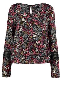 Black floral blouse with long sleeves, featuring bright pink, white, and blue flowers. Square neckline and keyhole back detail. Textured accents.