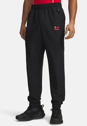 Under Armour, TECH SPORT - Tracksuit bottoms - black