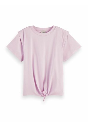 Camiseta de manga corta color lila con cuello redondo y detalle anudado en el dobladillo. Fabricada en algodón suave, con un ajuste ligeramente holgado.