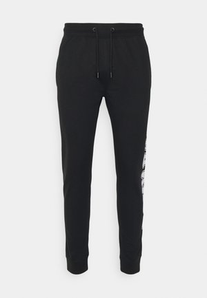 BUBBLE JOGGER UNISEX - Tracksuit bottoms - black