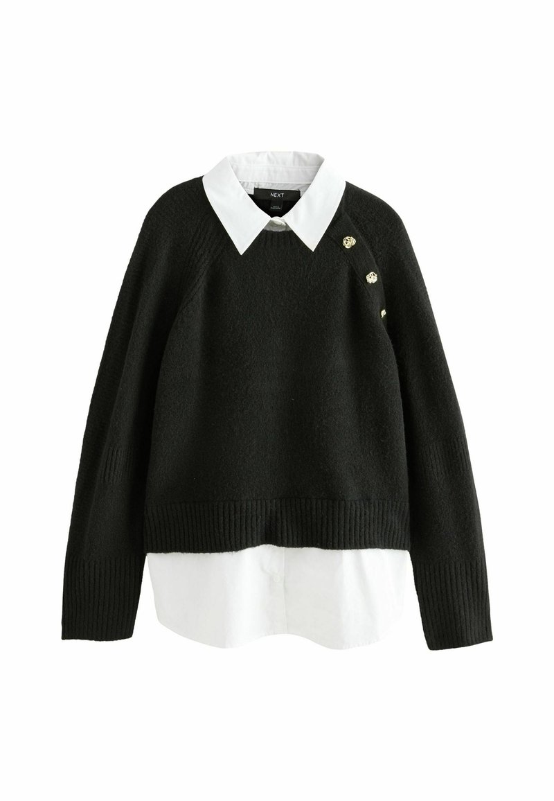 Sort strikket sweater med hvid krave, cropped længde, ribbet kant og tre guldknap detaljer på venstre skulder.