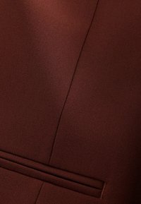 Next MOTION FLEX  - Liemenė - brick red