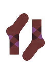 Brązowe skarpetki w geometryczny wzór argyle z ciemnobrązowymi, fioletowymi i jaśniejszymi odcieniami. Gładka faktura, prążkowany top.