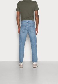 ARKET Džíny Relaxed Fit - blue