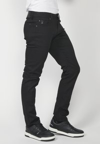 Koroshi STRETCH  - Vaqueros rectos - black
