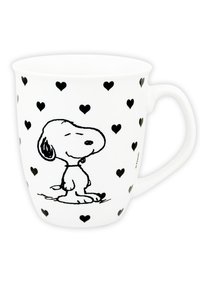 Mug in ceramica bianca con contorno nero di un cane con un'espressione sorridente, circondato da piccoli cuori neri. Forma arrotondata con manico.