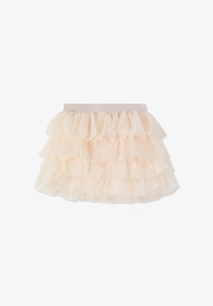 Spódnica tiulowa w jasnobeżowym kolorze z warstwowymi falbanami. Elastyczna talia i miękka, przejrzysta faktura z wieloma warstwami dla uzyskania objętości.