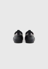 HUGO MORRIE - Trainers - black