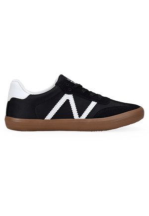 Black sneaker with white accents, rubber sole, and lace-up design. Features suede and fabric materials, with a prominent logo on the side.